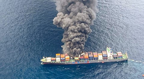 Thick smoke billows from Singapore-flagged container vessel MV WAN HAI 1503 following an explosion, about 130 nautical miles northwest of Kerala coast.