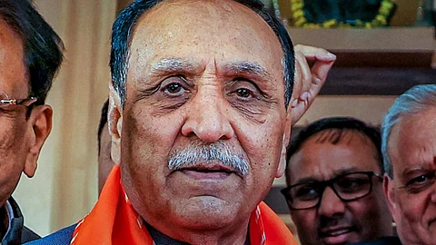 file image former Gujarat Chief Minister Vijay Rupani being welcomed by Rajasthan BJP President Madan Rathore as he arrives for a meeting at BJP office in Jaipur.