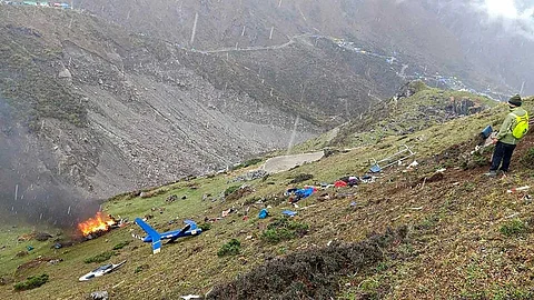 Seven people were killed as a helicopter carrying them from the Kedarnath shrine in Uttarakhand crashed early Sunday in the forests of Gaurikund amid poor visibility.