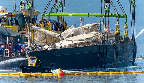 Superyacht is pulled from depths 10 months after sinking off Sicily
