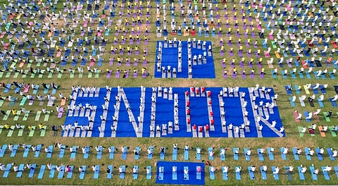 Indian Air Force personnel take part in a yoga session on the occasion of the International Day of Yoga.