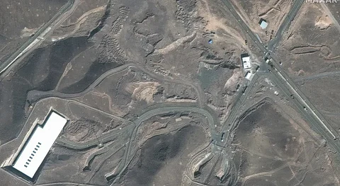 Satellite image shows vehicles at the Fordo enrichment facility in Iran on Friday, June 20, 2025.