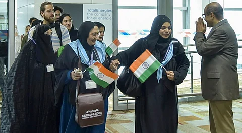 Indian nationals who were evacuated from Iran under Operation Sindhu arrive at Delhi airport.