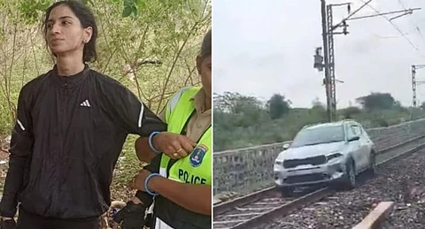 car driving on railway track
