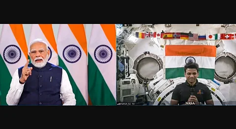 Prime Minister Narendra Modi during an interaction with Group Captain Shubhanshu Shukla, who is aboard the International Space Station as part of a commercial mission operated by Axiom Space.