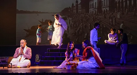 Actors perform during a theatrical presentation based on the life of Bharatiya Jana Sangh founder Syama Prasad Mookerjee, in New Delhi, Tuesday, July 8, 2025.
