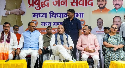Defence Minister Rajnath Singh with Uttar Pradesh Deputy Chief Minister Brajesh Pathak and others during the 'Prabuddh Jan Samwad' programme, in Lucknow, Saturday, July 12, 2025.