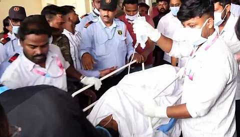 Medical staff brings the 15-year-old girl, who was undergoing treatment at AIIMS Bhubaneswar after three miscreants set her ablaze in Odisha's Puri district, to be airlifted to Delhi, in Bhubaneswar, Sunday, July 20, 2025.