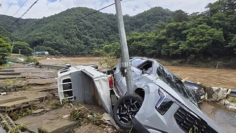 Heavy downpours in South Korea kill 14 and 12 others missing