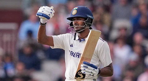 India's Sai Sudharsan celebrates his half century on day one of the fourth test cricket match between India and England, at the Old Trafford Cricket Ground, in Manchester, Wednesday, July 23, 2025.