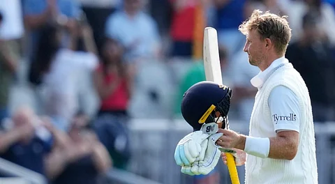 England's Joe Root greets the audience as he returns to pavilion after his dismissal by India�s Ravindra Jadeja on day three of the fourth test cricket match between India and England, at the Old Trafford Cricket Ground, in Manchester, Friday, July 25, 2025.