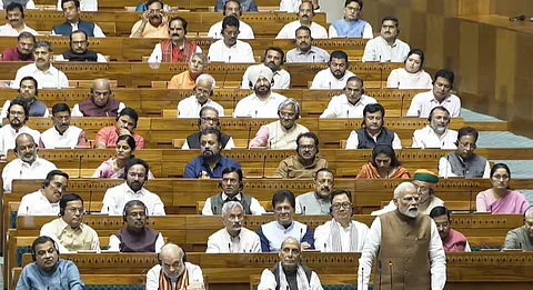 Prime Minister Narendra Modi speaks during a debate in the Lok Sabha on the Pahalgam terror attack and Operation Sindoor, at the Monsoon session of Parliament, in New Delhi, Tuesday, July 29, 2025.