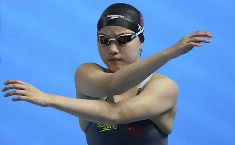 Chinese 12-year-old Yu Zidi has won a bronze relay medal at the swim world championships