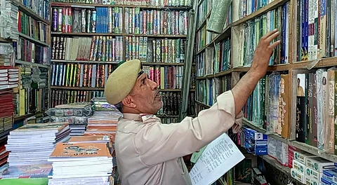 Police raid in a bookstall in Kashmir.
