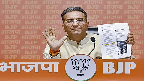 Resign from Lok Sabha, should have no faith in EC