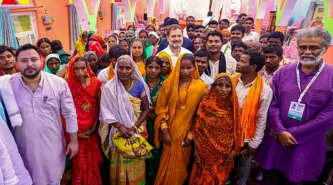 LoP in the Lok Sabha and Congress leader Rahul Gandhi with LoP in the Bihar Assembly and RJD leader Tejashwi Yadav and CPI (ML) Liberation General Secretary Dipankar Bhattacharya during a meeting with those people whose names have allegedly been deleted from the voter list in Bihar as part of the Election Commission's Special Intensive Revision (SIR) in the state.