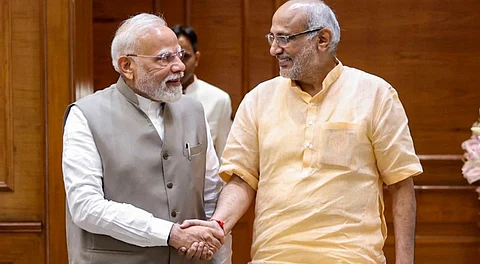 Prime Minister Narendra Modi with Maharashtra Governor CP Radhakrishnan during a meeting, in New Delhi.