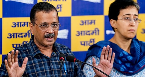 Aam Aadmi Party (AAP) chief Arvind Kejriwal addresses a press conference with party leader Atishi, in New Delhi, Thursday, Aug. 28, 2025.