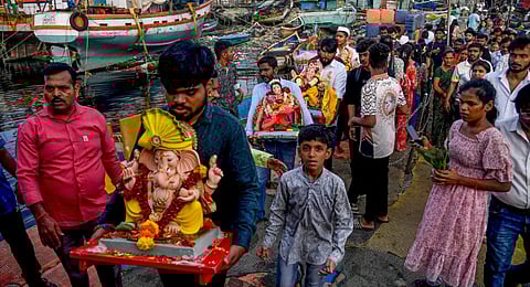 A Ganesh Chaturthi idol procession in Mumbai, Wednesday, Sept. 3, 2025.