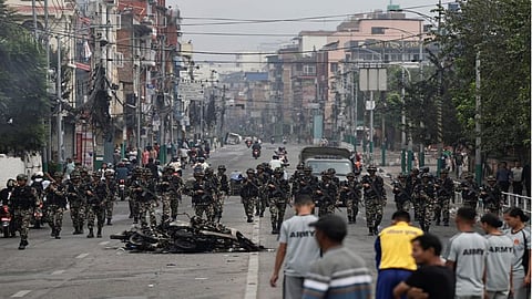 Three dead in clashes and over 15,000 inmates escape from Nepal jails