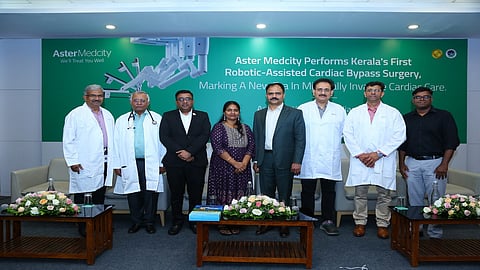 The patient, Nisha Purushothaman who has successffully undergone state’s first-ever robotic-assisted Coronary Artery Bypass Grafting (CABG) surgery, with the surgery team at Aster Medcity