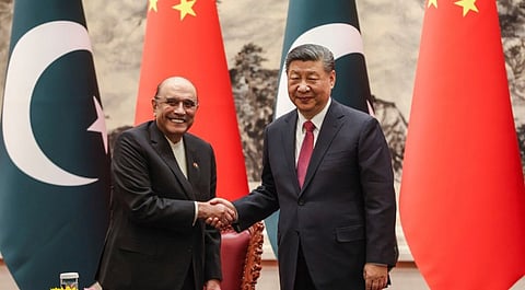 Chinese President Xi Jinping, right, shakes hands with Pakistani President Asif Ali Zardari at the Great Hall of the People in Beijing, China on February 5, 2025