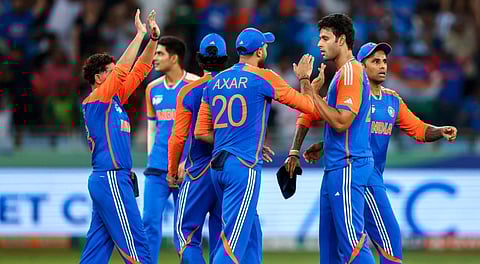 India's Shivam Dube celebrates with teammates after taking the wicket of Pakistan's Saim Ayub during the Asia Cup 2025 Super Four match between India and Pakistan, in Dubai, UAE.