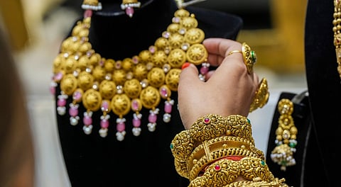 Gold ornaments on display at a jewellery showroom, in New Delhi.