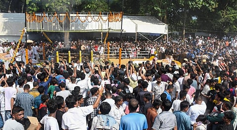 People gather during the funeral of singer Zubeen Garg, on the outskirts of Guwahati, Tuesday, Sept. 23, 2025. Zubeen Garg died while scuba diving in Singapore.