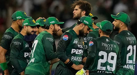 Pak players celebrate their win over Bangladesh.