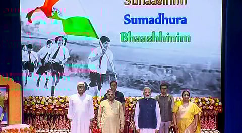 Prime Minister Narendra Modi, RSS Sarkaryavah Dattatreya Hosabale, Delhi Chief Minister Rekha Gupta and others during the centenary celebrations of the Rashtriya Swayamsevak Sangh (RSS) at Dr Ambedkar International Centre in New Delhi.