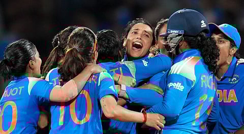 India's players celebrate the wicket of South Africa�s Chloe Tryon during the ICC Women's World Cup final ODI cricket match between India Women and South Africa Women, at the DY Patil Stadium, in Navi Mumbai, Sunday, Nov. 2, 2025.
