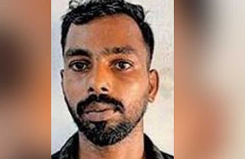 Arun, a porter at Kochuveli railway station