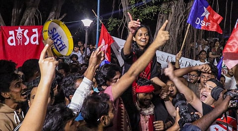 Joint Secretary of AISA Danish Ali celebrates her victory in the JNUSU elections, in New Delhi, Thursday, Nov. 6, 2025.