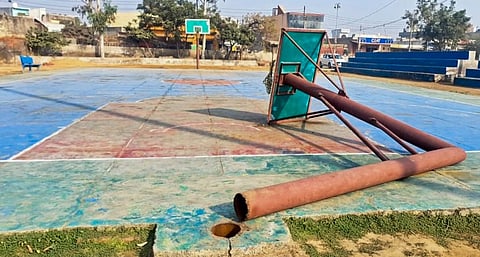 An iron pole of a basketball hoop lies on the court after it fell on Hardik Rathi, a 16-year-old national-level player who died in the freak accident, in Rohtak, Wednesday, Nov. 26, 2025.