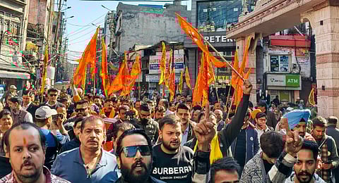 Members of Shri Mata Vaishno Devi Sangharsh Samiti (SMVSS) raise slogans during a protest against the grant of majority seats in MBBS to Muslim students from Kashmir at the Shri Mata Vaishno Devi Institute of Medical Excellence (SMVDIME), in Jammu, Saturday, Nov. 29, 2025.
