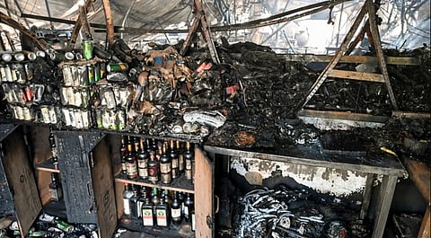 Charred remains of the nightclub after a fire broke out due to a cylinder blast, in North Goa district, Sunday, Dec. 7, 2025.