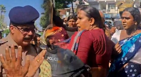 Police try to control the clash involving BJP workers and transgender voters in Vanchiyoor.
