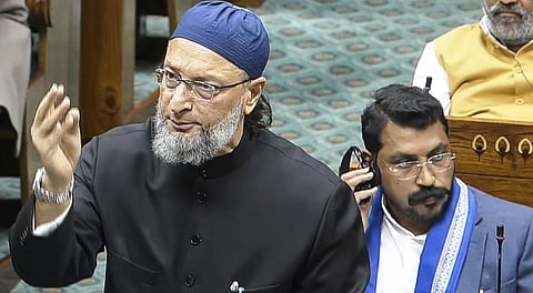 MP Asaduddin Owaisi speaks in the Lok Sabha during the Winter session of Parliament, in New Delhi, Wednesday, Dec. 10, 2025.