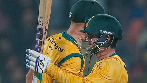 South Africa's Quinton de Kock, right, celebrates his half century with captain Aiden Markram during the second T20 International cricket match of a series between India and South Africa, at Maharaja Yadavindra Singh International Cricket Stadium, in New Chandigarh, Thursday, Dec. 11, 2025.