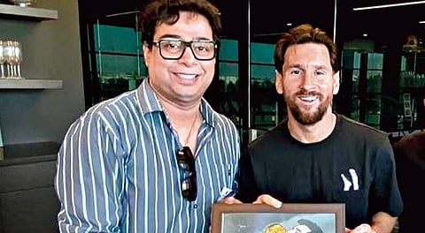 Satadru Dutta with Lionel Messi