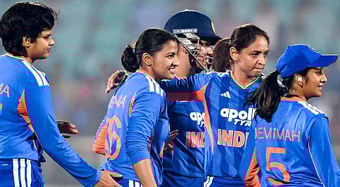 India's Sneh Rana celebrates with teammates after taking the wicket of Sri Lanka's captain Chamari Athapaththu during the second T20I cricket match between India and Sri Lanka, in Visakhapatnam, Andhra Pradesh, Tuesday, Dec. 23, 2025.