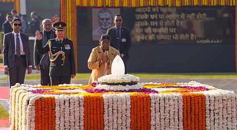 President Droupadi Murmu pays tribute to former Prime Minister Atal Bihari Vajpayee on his 101st birth anniversary, at Sadaiv Atal in New Delhi, Thursday, Dec. 25, 2025.