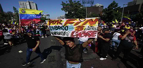 Millions of Venezuelans scattered across Latin America cautiously watch what comes next