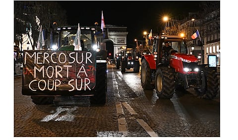 French farmers drive 350 tractors to Parliament to protest low incomes, EU trade deal