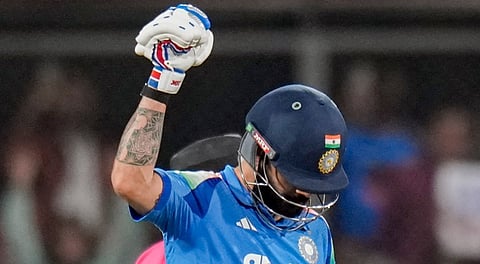 Virat Kohli celebrates his half century during the third ODI cricket match between India and New Zealand, at Holkar Cricket Stadium, in Indore, Madhya Pradesh, Sunday, Jan. 18, 2026.