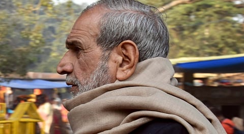 Congress leader Sajjan Kumar leaves after offering prayers at Hanuman Temple, Connaught Place, in New Delhi.