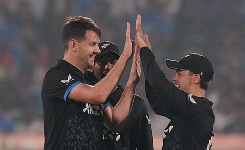 New Zealand's Jacob Duffy, left, celebrates with teammates after taking the catch of India's captain Suryakumar Yadav during the fourth T20I cricket match between India and New Zealand, at ACA-VDCA Cricket Stadium, in Visakhapatnam, Andhra Pradesh, Wednesday, Jan. 28, 2026.