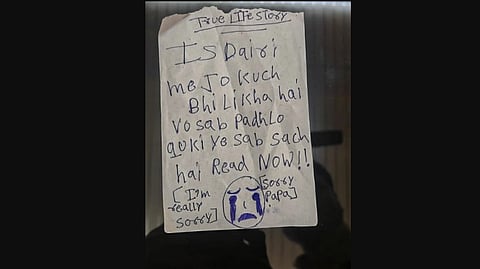 In this image received on Feb. 4, 2026, a handwritten note that investigators recovered from the residence of three minor sisters who died after allegedly jumping off the balcony of a ninth-floor flat, in Ghaziabad, Uttar Pradesh.