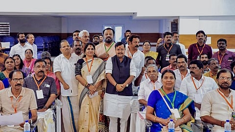 In this image posted on Feb. 7, 2026, BJP National President Nitin Nabin poses for a group photo with Shakti Kendra in-charges and BJP workers during his visit, in Thrissur, Kerala.